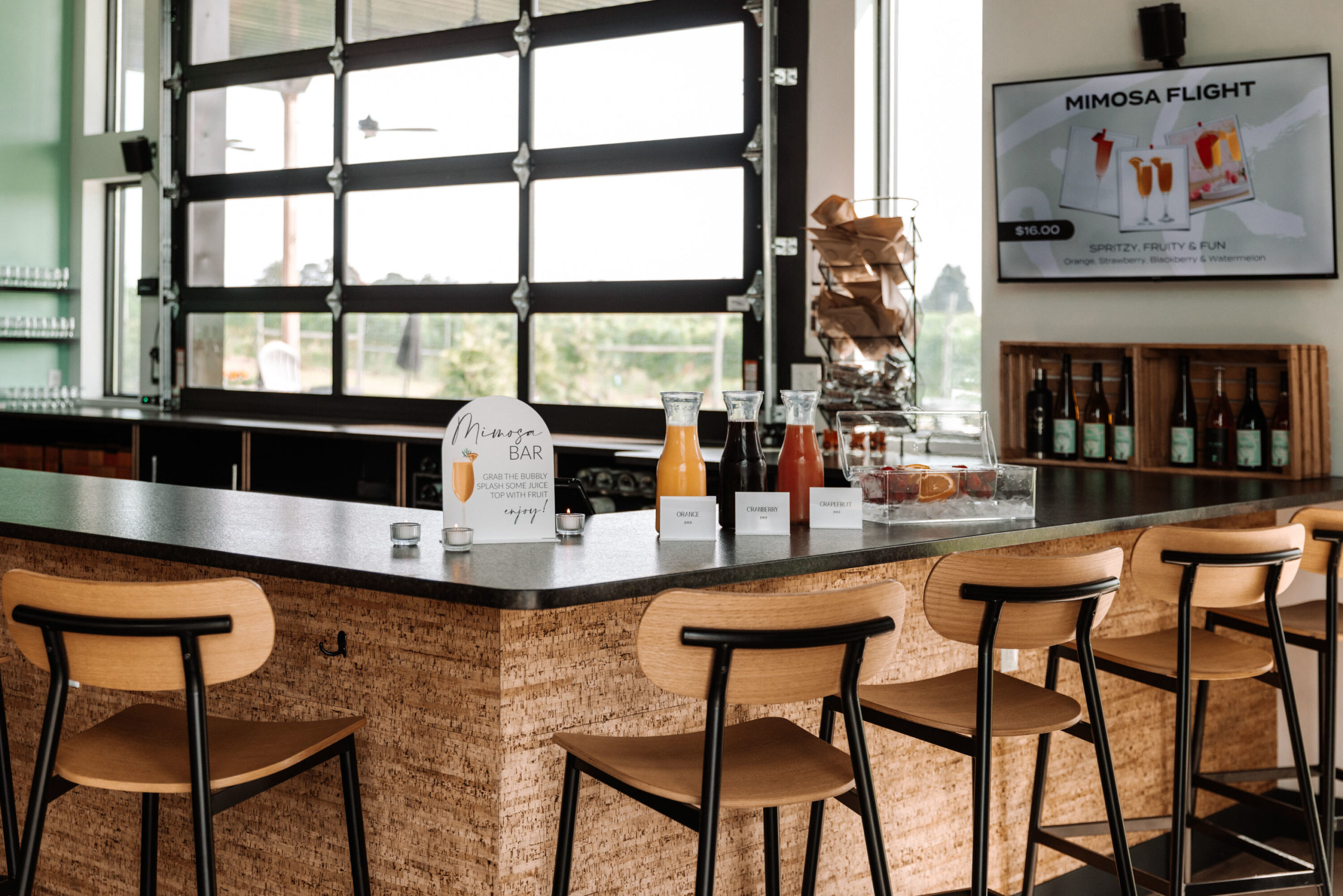 Mimosa bar setup at a baby shower