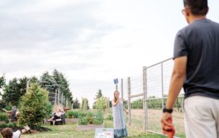 Playing corn hole and yard games at the winery